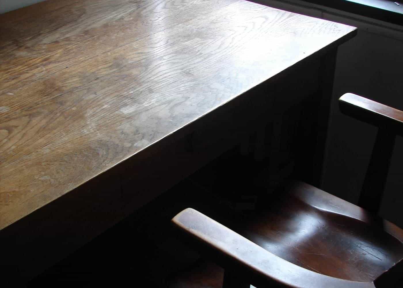 A study desk tucked into the corner of a room