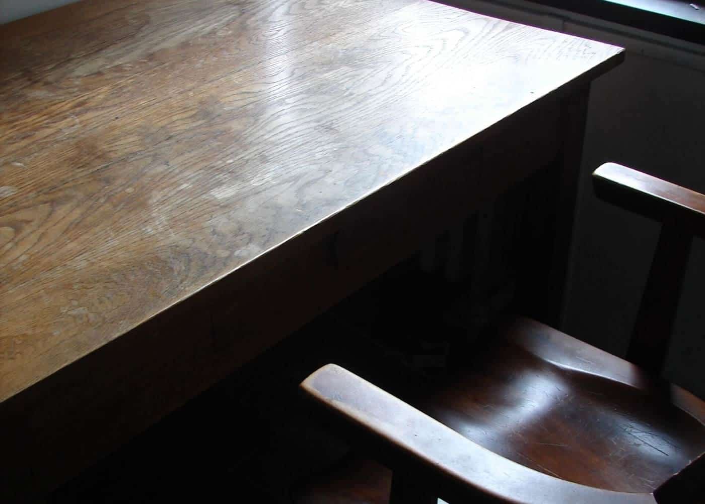 A study desk tucked into the corner of a room